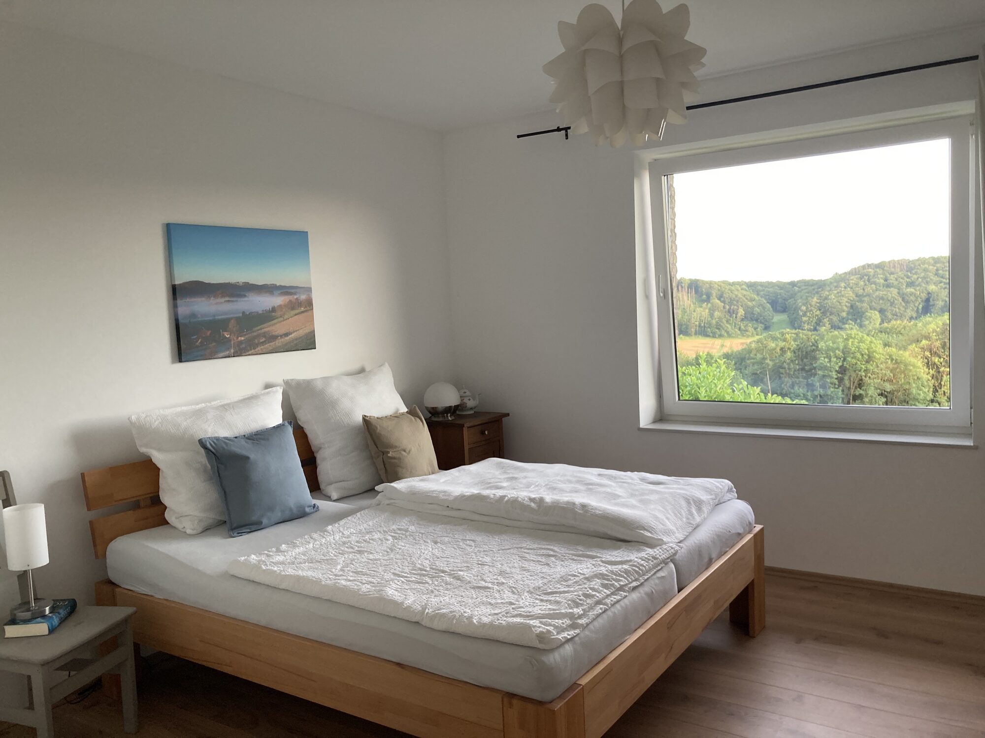 Schlafzimmer mit Waldblick